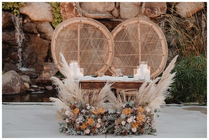 Elegant outdoor boho table setup with candles