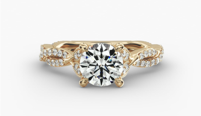 Gold diamond engagement ring with intricate design